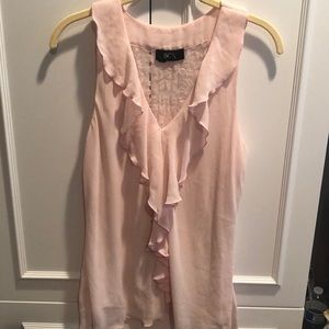 Pink sleeveless blouse with lace back